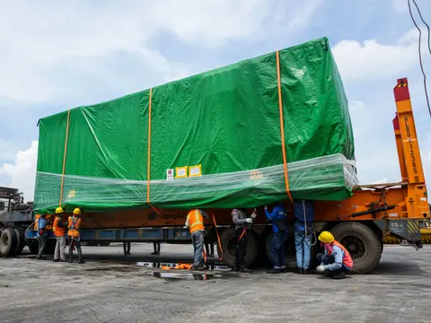 Oversized project cargo secured on a heavy-lift trailer